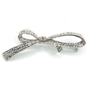 Elegant Silver Bow Brooch